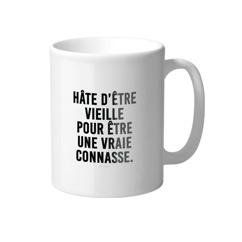 Mug blanc avec des designs colorés et humoristiques